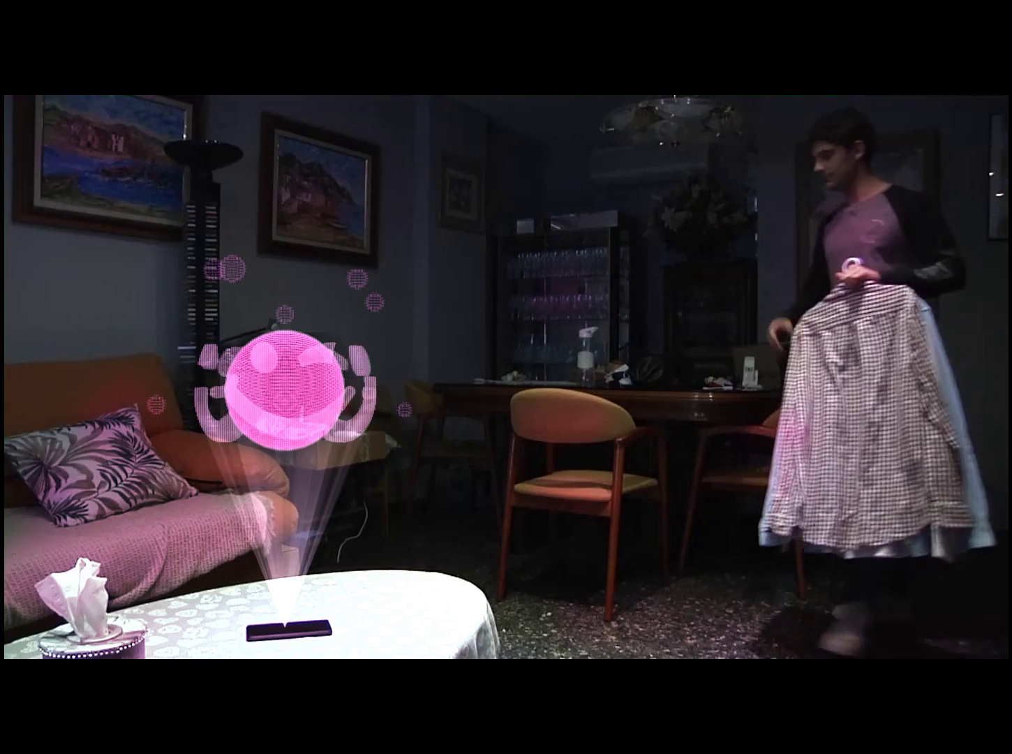 Man hanging clothes with and hologram